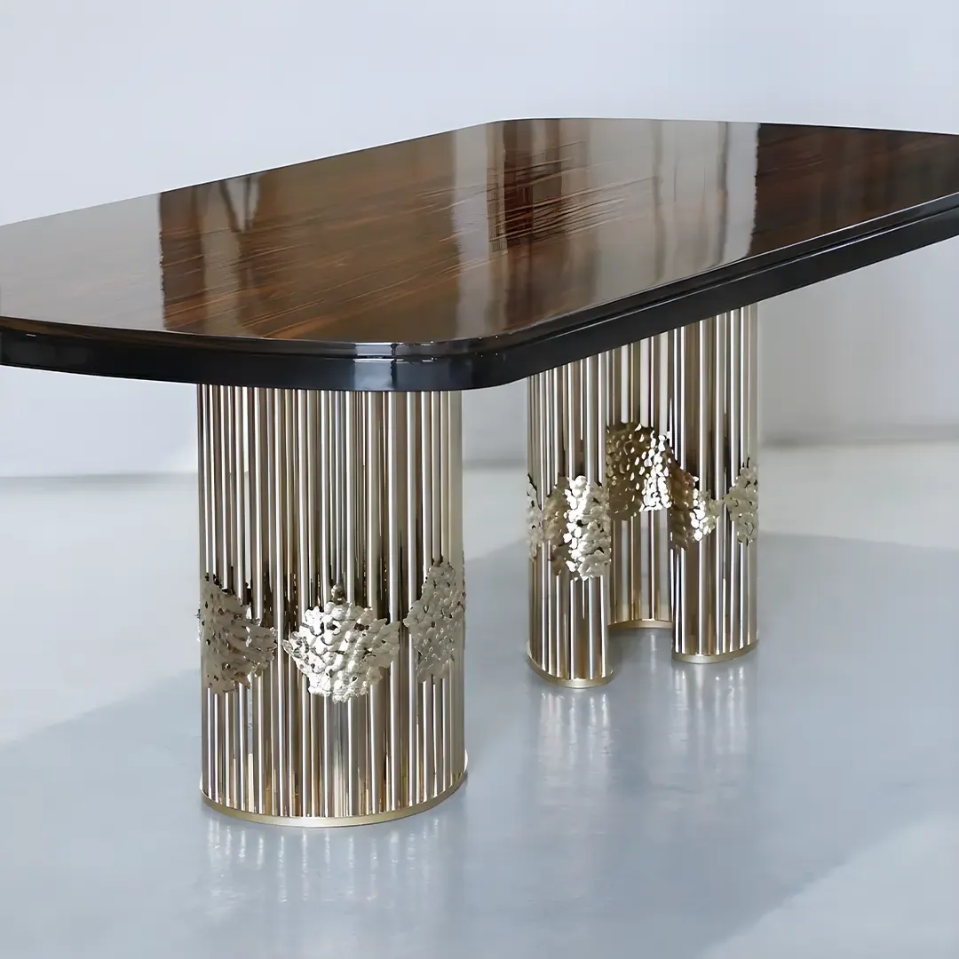 /storage/Magma Dining Table by Castro Lighting, a luxury dining table handcrafted in Portugal with a sculptural brass base inspired by molten magma and a refined tabletop for contemporary dining rooms.