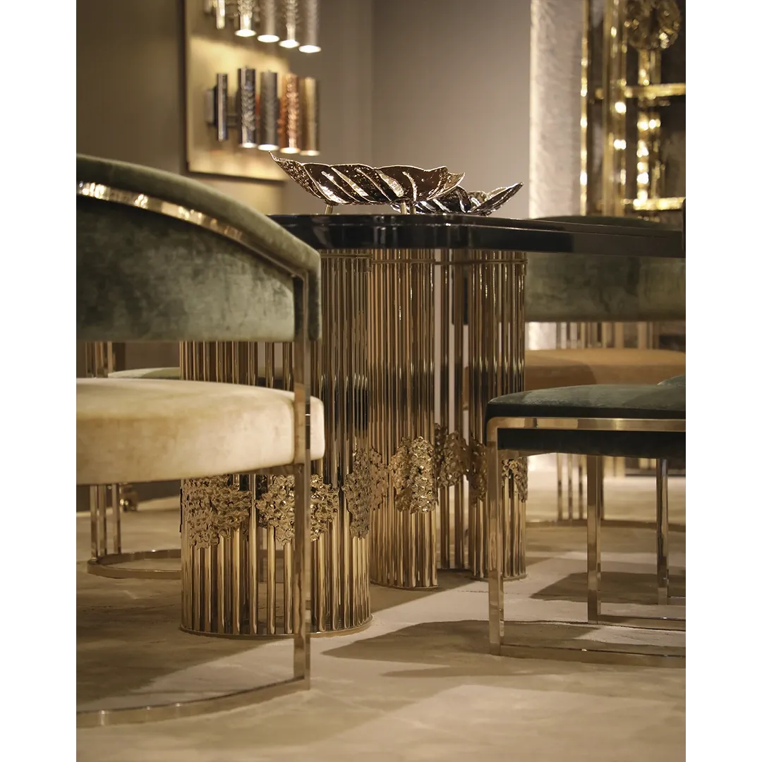 /storage/Magma Dining Table by Castro Lighting, a luxury dining table handcrafted in Portugal with a sculptural brass base inspired by molten magma and a refined tabletop for contemporary dining rooms.
