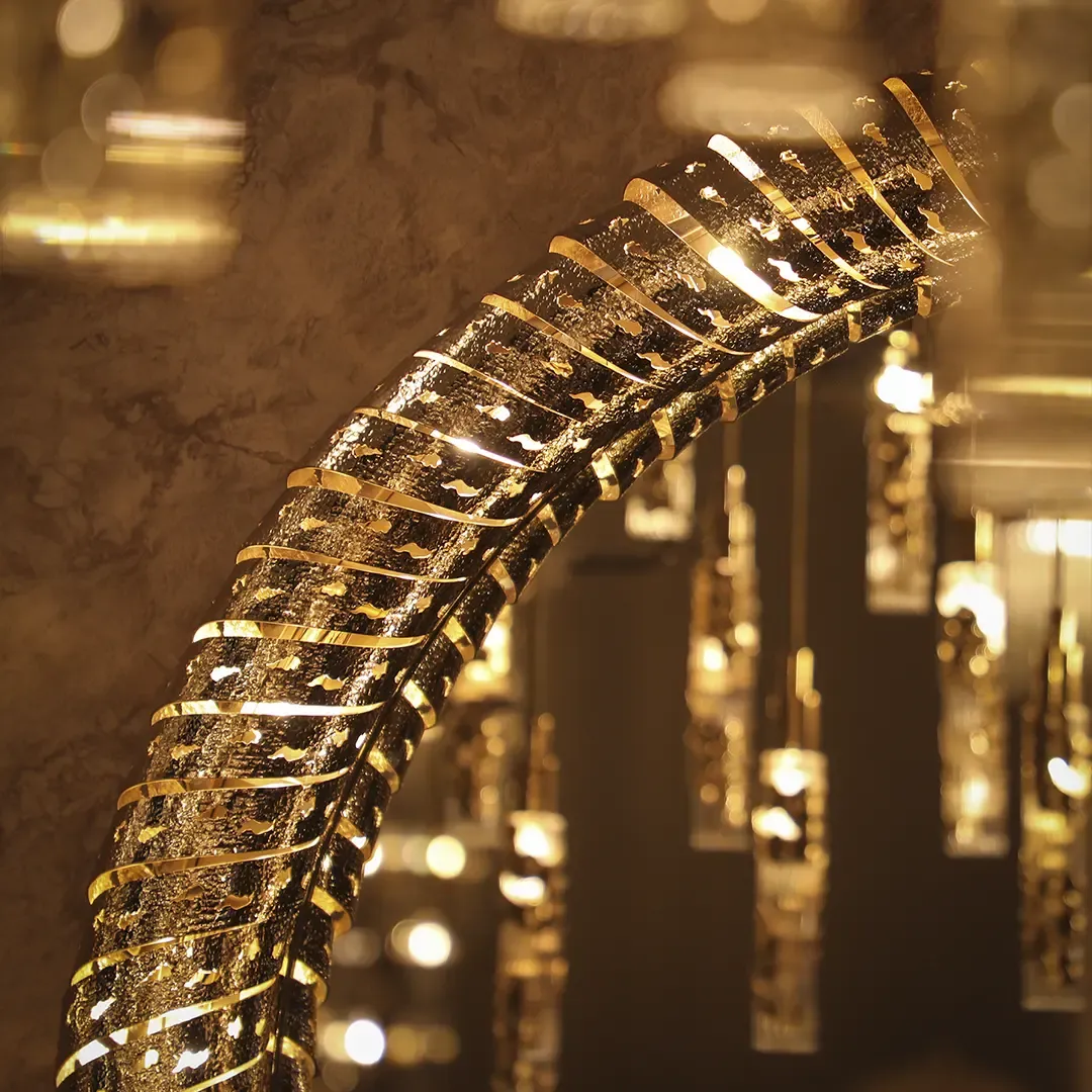 /storage/Luxury brass statement wall mirror by Castro Lighting with sculptural organic frame inspired by molten magma, handcrafted in Portugal for contemporary and sophisticated interiors.