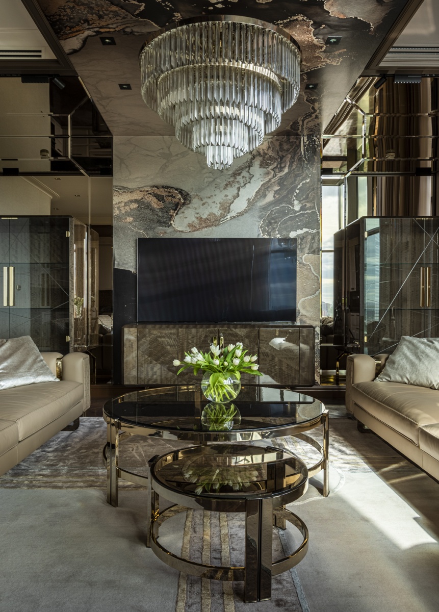 /storage/Luxury brass and glass Marie center table with two-tier design, an elegant accent piece for sophisticated interiors.