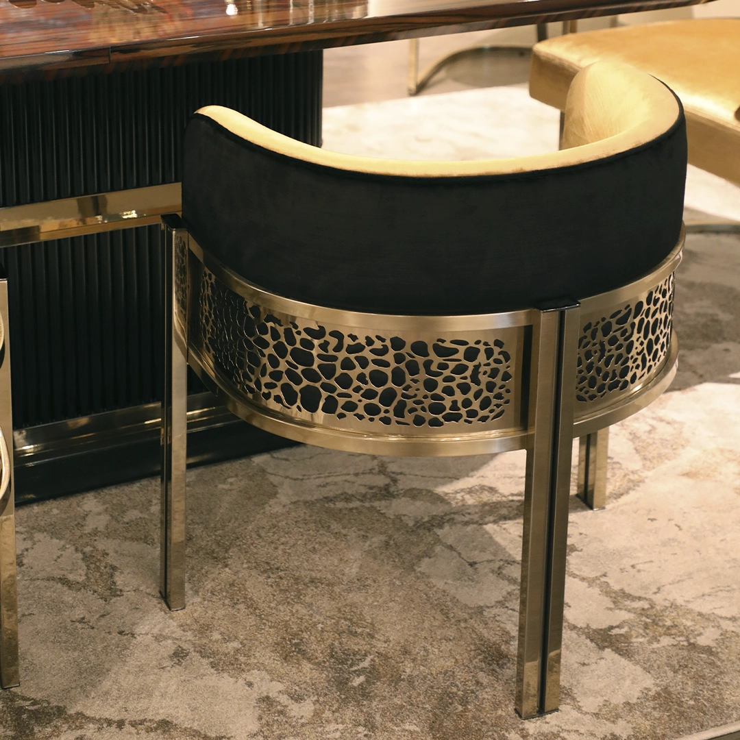/storage/Luxury brass chair combining queenly opulence with safari-inspired design.