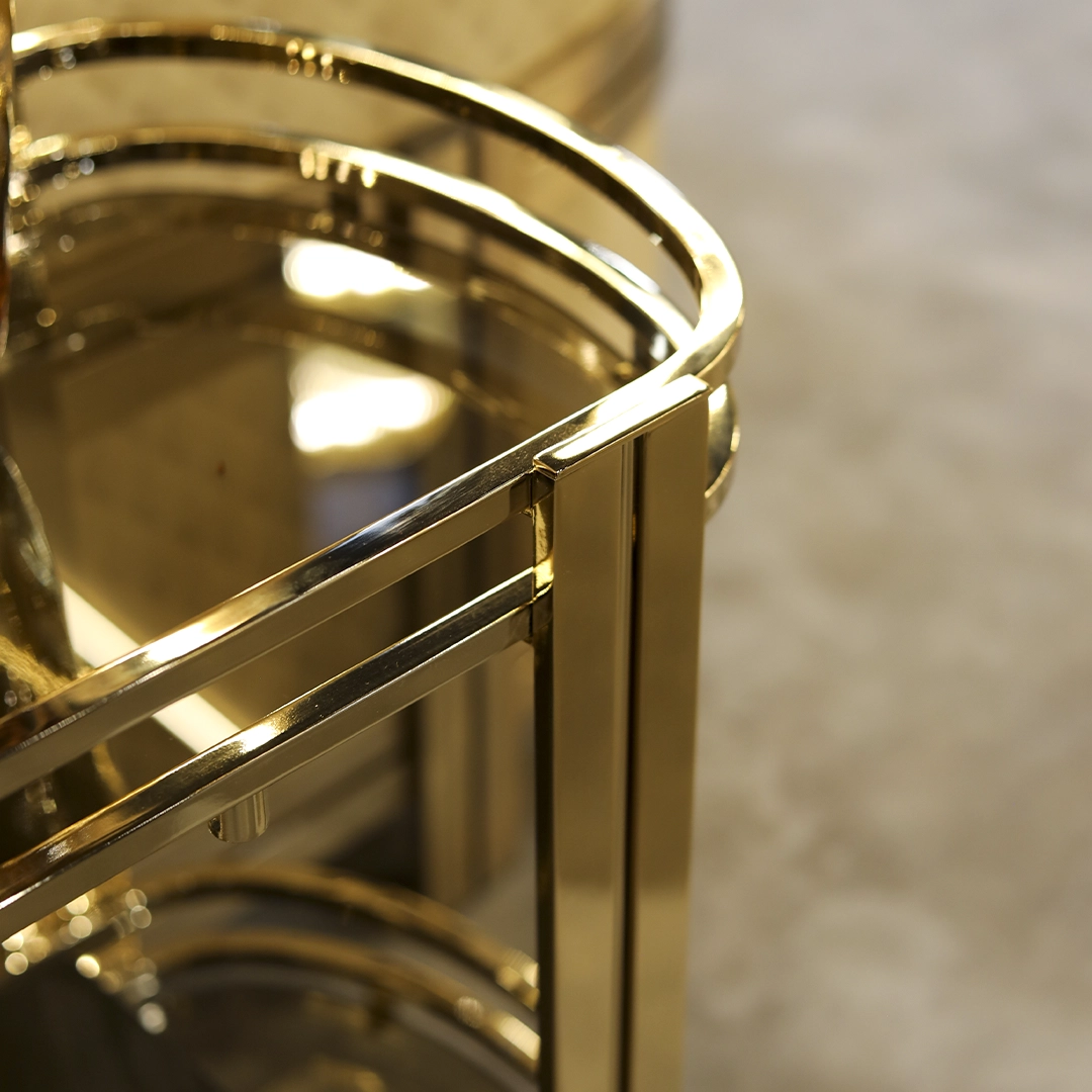 /storage/Luxury brass Marie tea cart with sleek design, spacious shelves, and modern detailing, a sophisticated serving cart for elegant interiors.