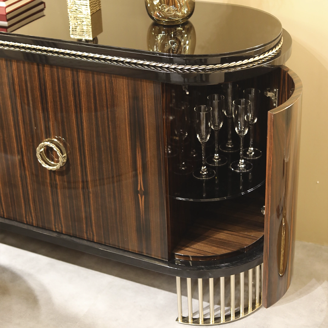 /storage/Luxury brass-accented Nautilus sideboard in ebony veneer with glass details, a modern classic design exuding naval inspiration and sophisticated elegance.
