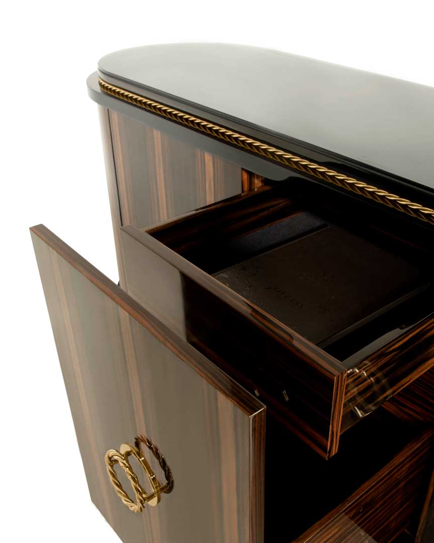 /storage/Luxury brass-accented Nautilus sideboard in ebony veneer with glass details, a modern classic design exuding naval inspiration and sophisticated elegance.