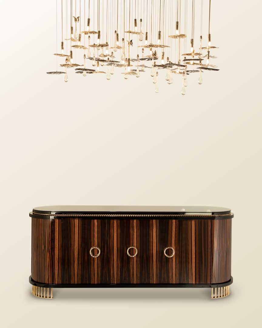 /storage/Luxury brass-accented Nautilus sideboard in ebony veneer with glass details, a modern classic design exuding naval inspiration and sophisticated elegance.