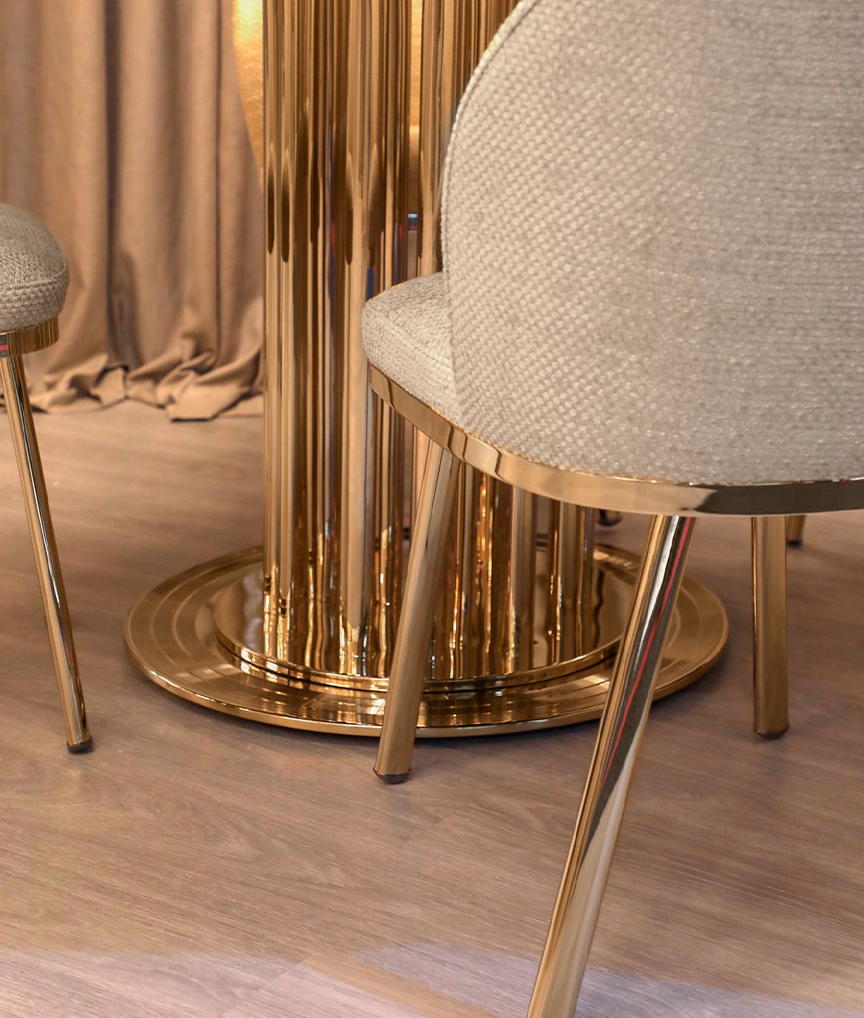 /storage/Luxury brass Penelope Chair with gold-plated brass legs, black nickel details, and premium customizable upholstery, embodying feminine sophistication and art-deco elegance.