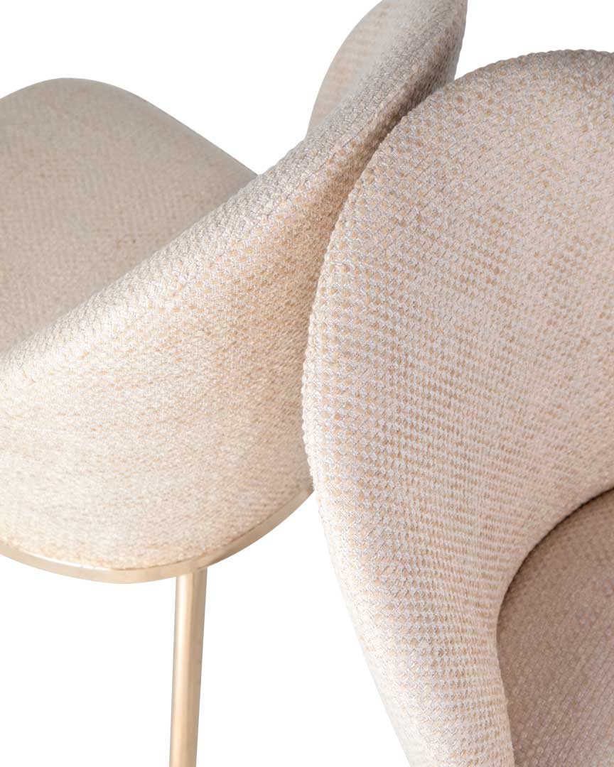 /storage/Luxury brass Penelope Chair with gold-plated brass legs, black nickel details, and premium customizable upholstery, embodying feminine sophistication and art-deco elegance.