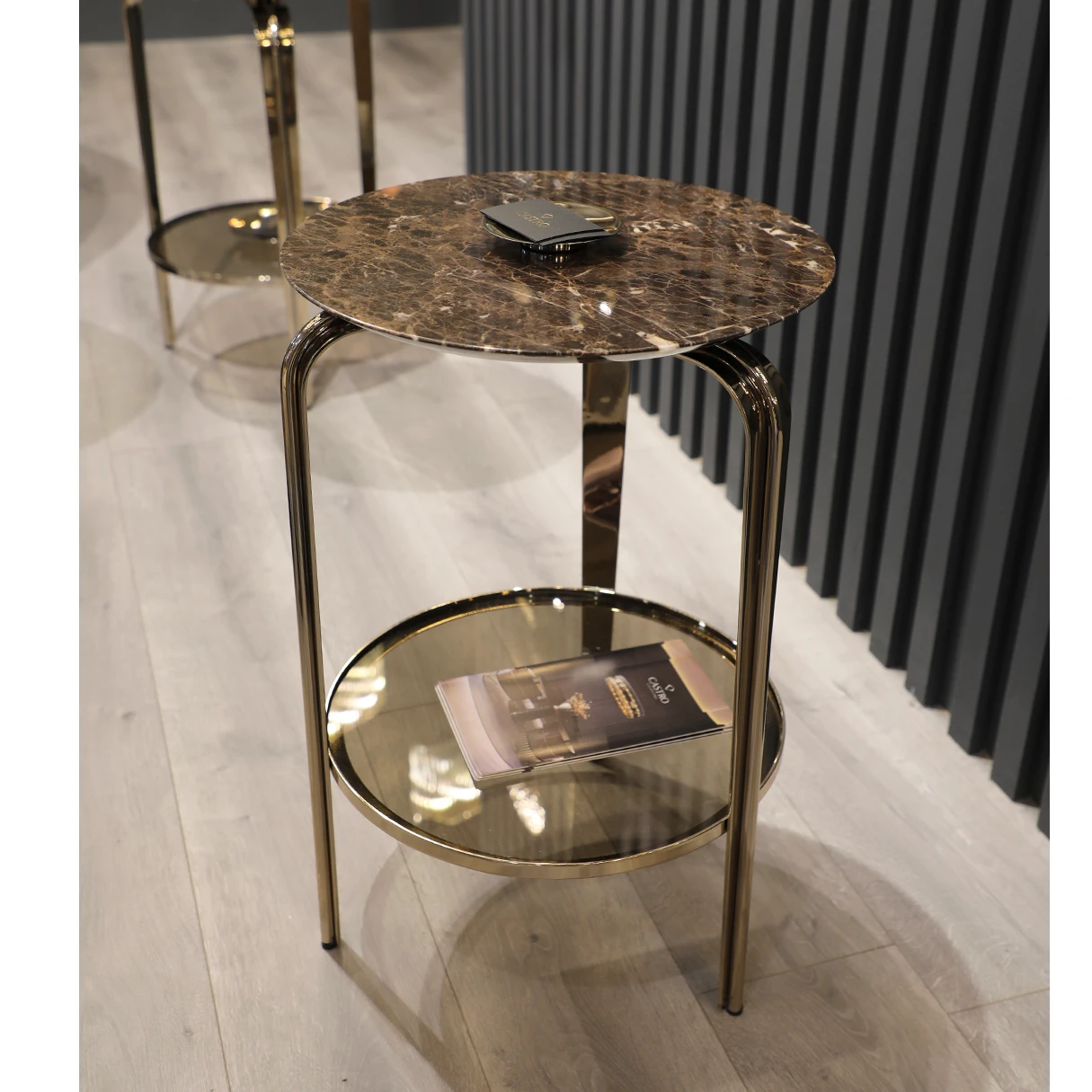 /storage/Luxury brass and marble Perla side table with textured glass base and shell-inspired design, a poetic modern accent piece for refined interiors.