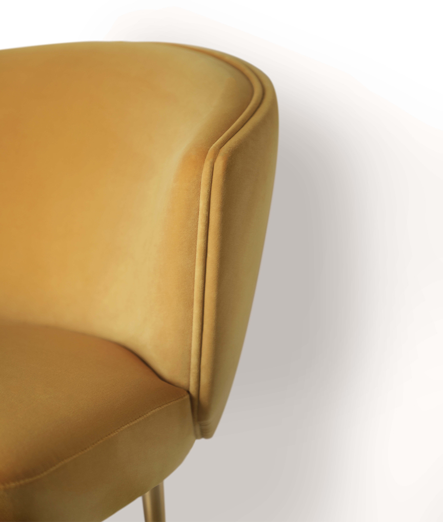 /storage/Luxury brass chair with velvet upholstery and elegant detailing, inspired by Italian design by Castro Interiors