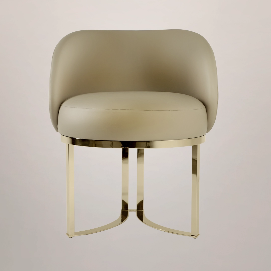 /storage/Luxury brass chair with beige leather upholstery and twisted brass detailing, blending feminine charm with refined contemporary design.