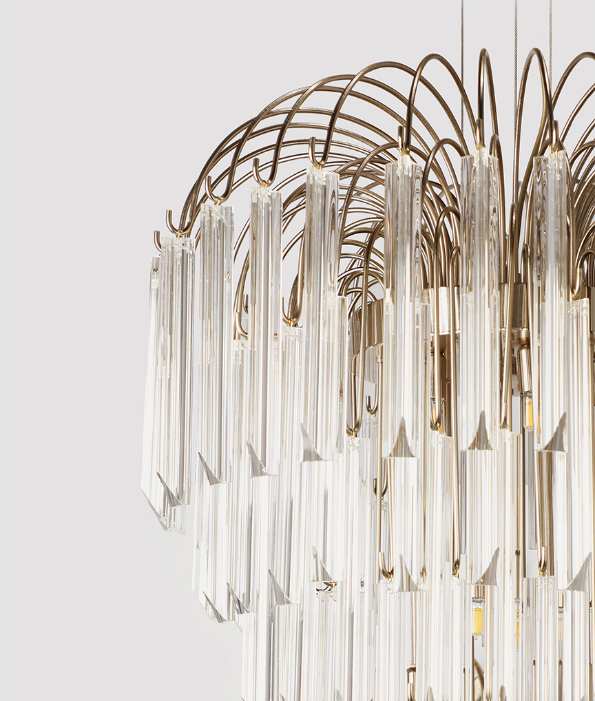 /storage/Luxury brass suspension with 24k gold arms and delicate glass elements, inspired by the shape and elegance of a lotus flower.