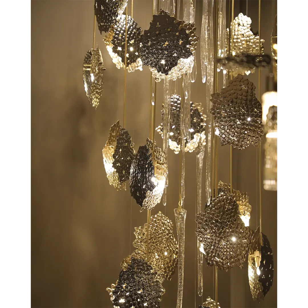/storage/Magma Suspension by Castro Lighting, a luxury sculptural chandelier handcrafted in Portugal with irregular forms inspired by molten magma, designed for contemporary and sophisticated interiors.