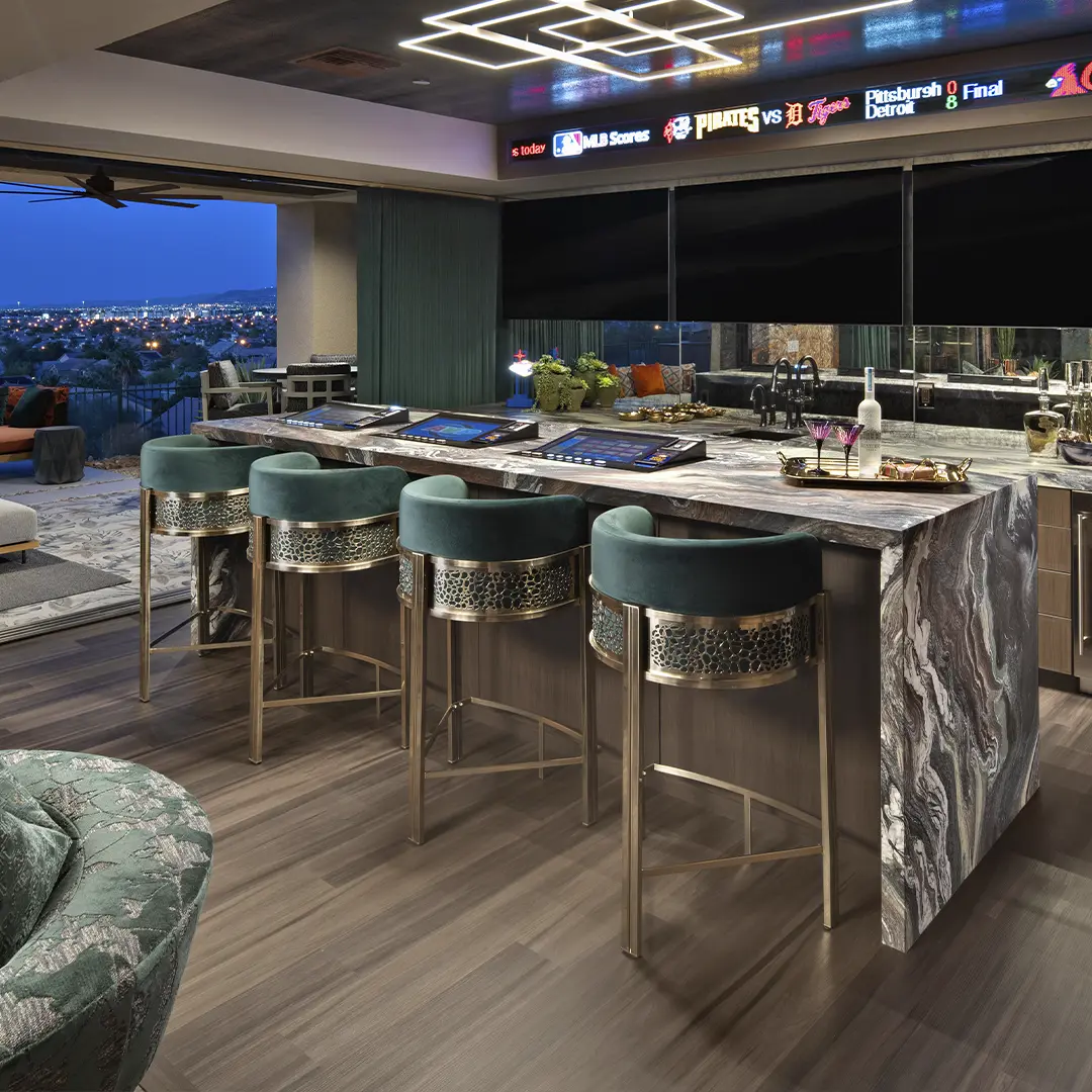 /storage/Luxury brass bar chair with beige upholstery and hand-sculpted giraffe print backrest, blending regal elegance with safari-inspired design.