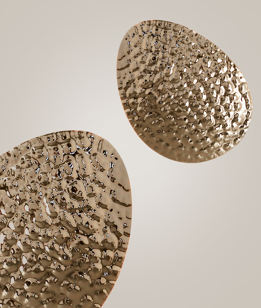 /storage/Luxury brass wall plates with delicate hammered brass and minimalist design by Castro Lighting.