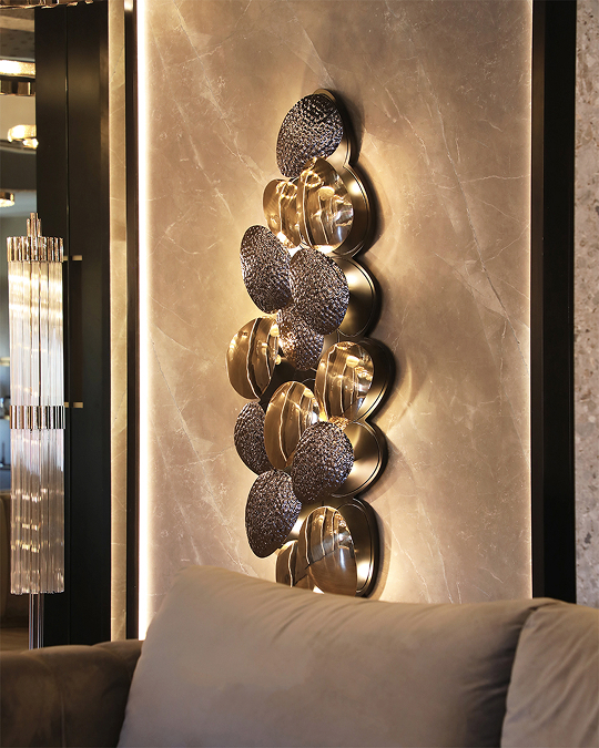 /storage/Luxury brass Mastery Wall Light with handcrafted gold-plated brass plates, modern elegant design.