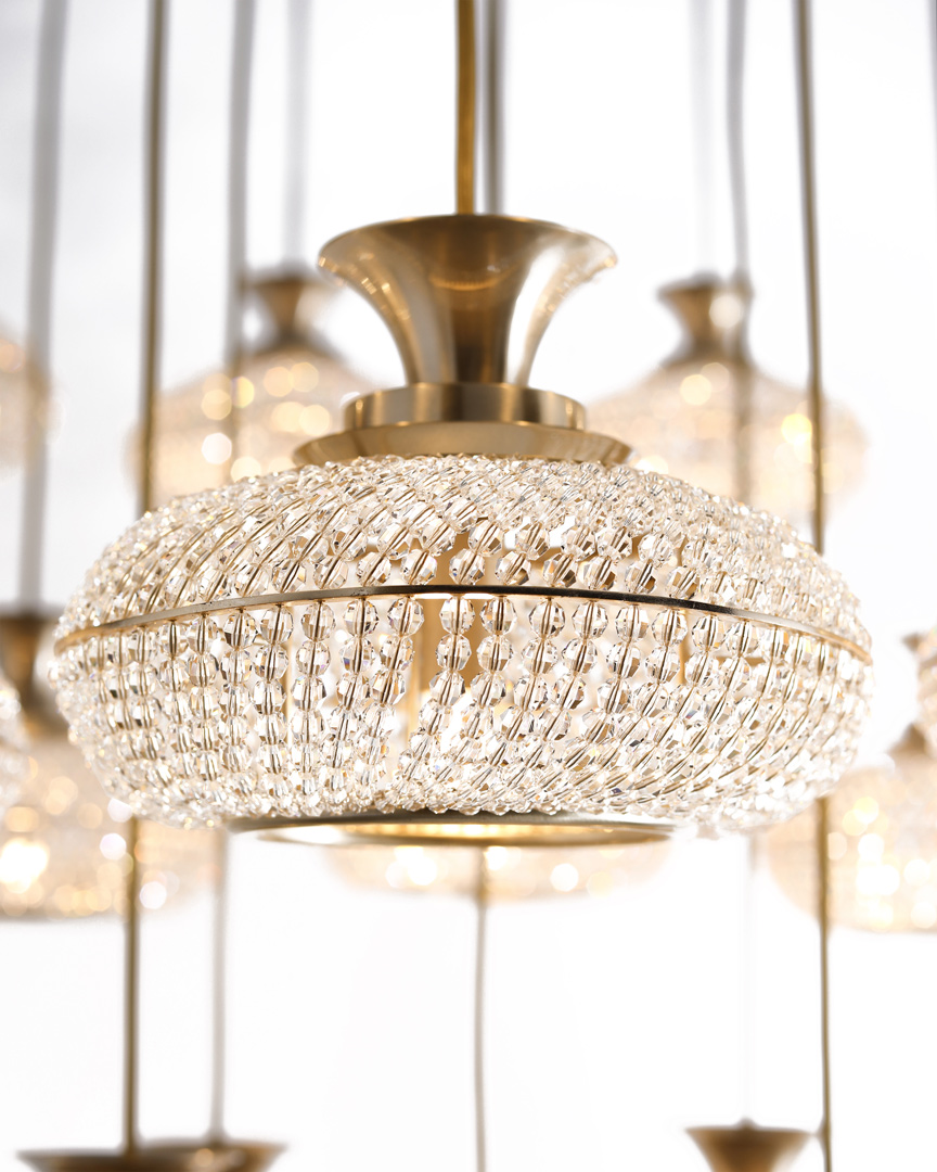 /storage/Luxury brass Mystic Suspension chandelier with clear crystal strips in a round, slightly flattened design, blending classical style and timeless sparkle for grand interiors.