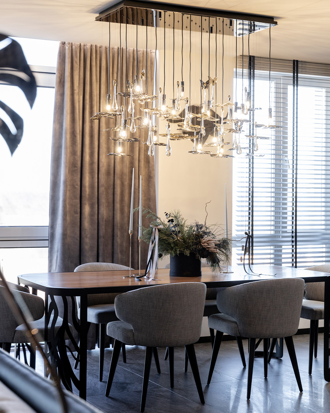 /storage/Rainforest Suspension transforming a Kyiv dining room with bespoke luxury lighting.