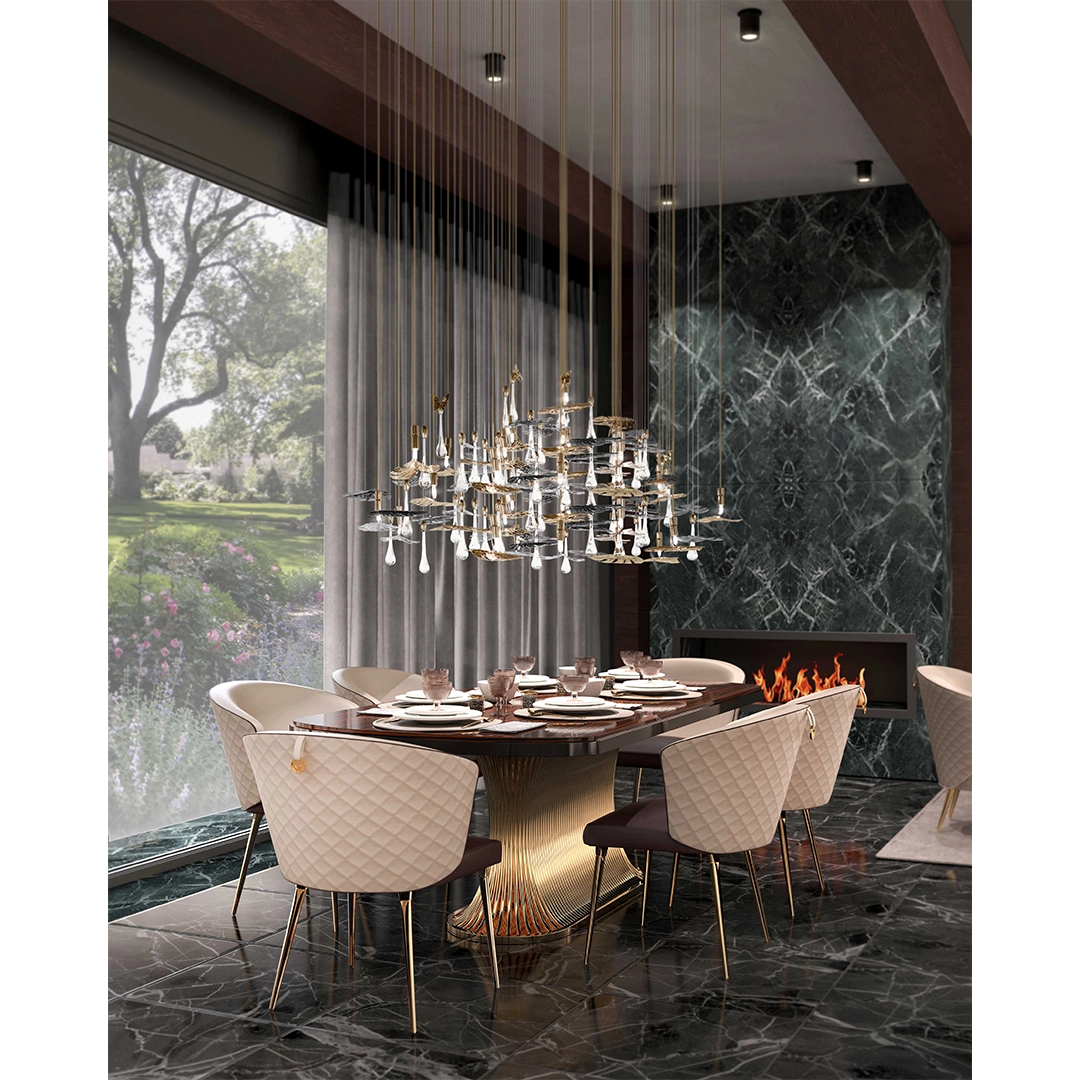/storage/Luxury brass suspension with nature-inspired raindrop and butterfly details by Castro Lighting.
