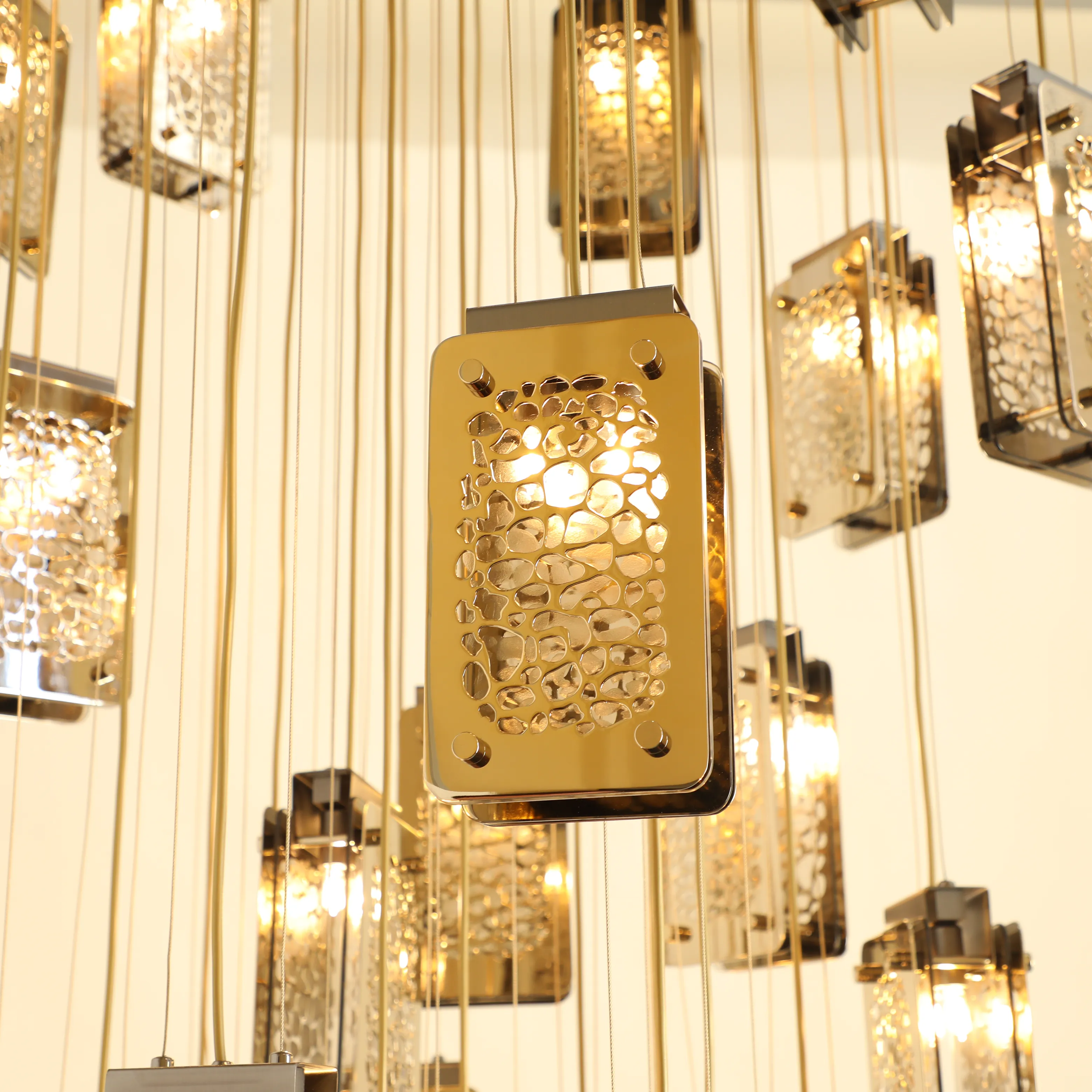 /storage/Luxury brass Safari Suspension with handcrafted giraffe print brass plates and bronze glass.