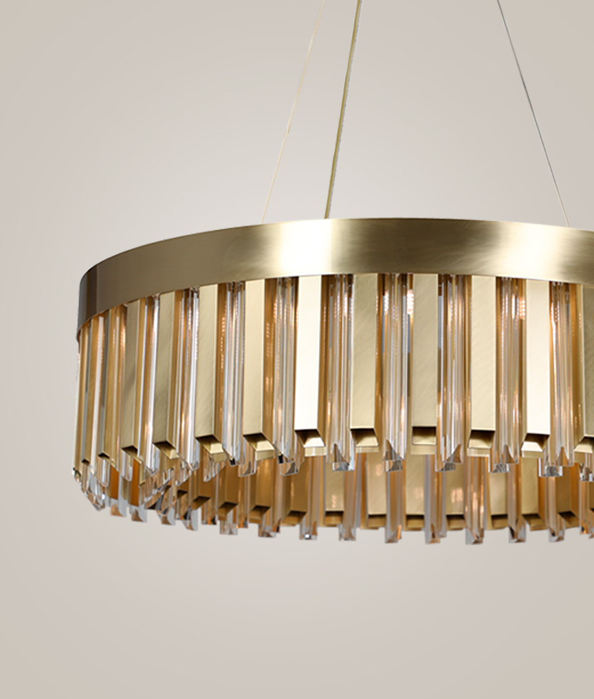 /storage/Luxury brass Skylar Suspension chandelier with glass elements, a bold handcrafted design inspired by celestial geometry.