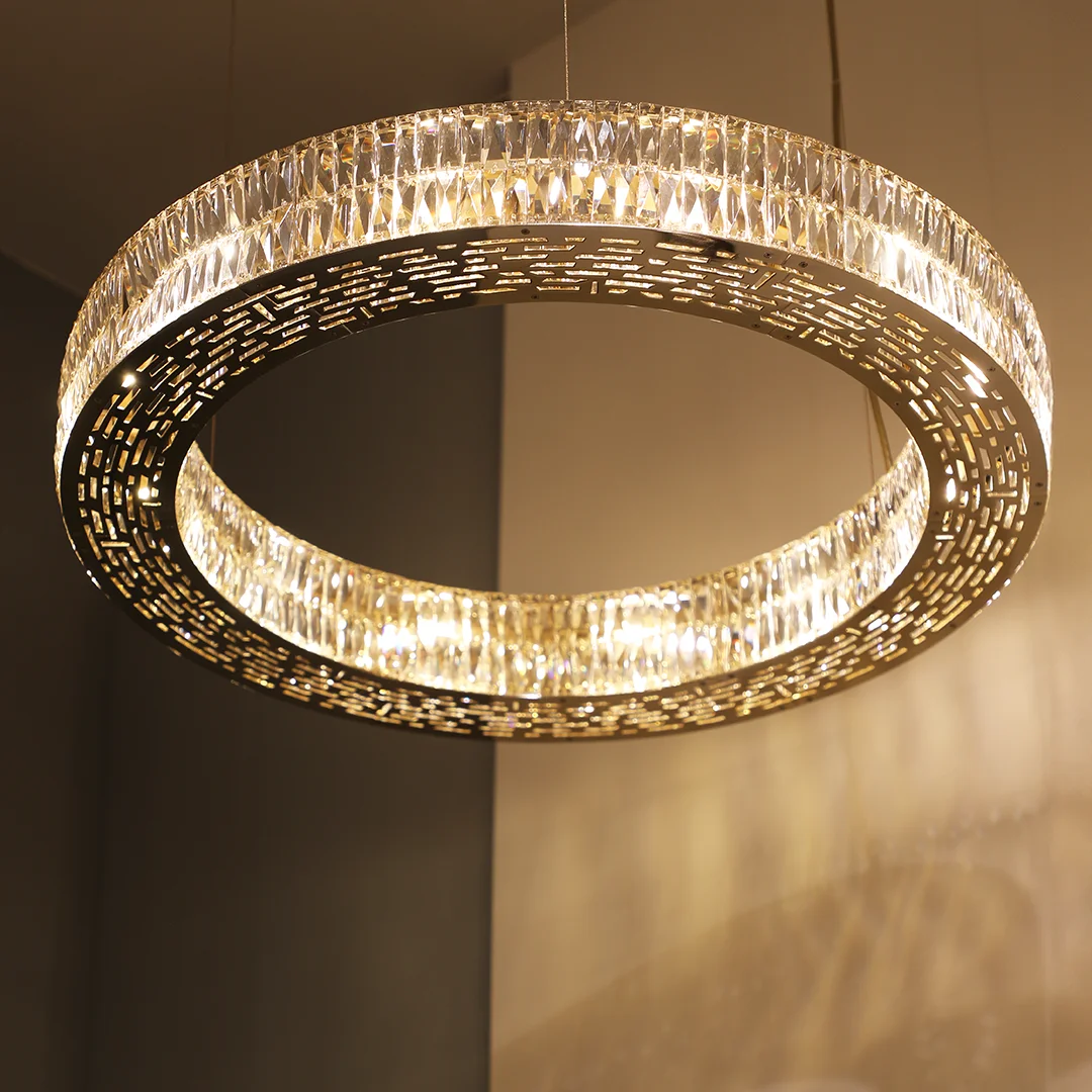 /storage/Luxury brass and crystal chandelier with layered gemstone design, handmade to create a dazzling and elegant lighting effect.