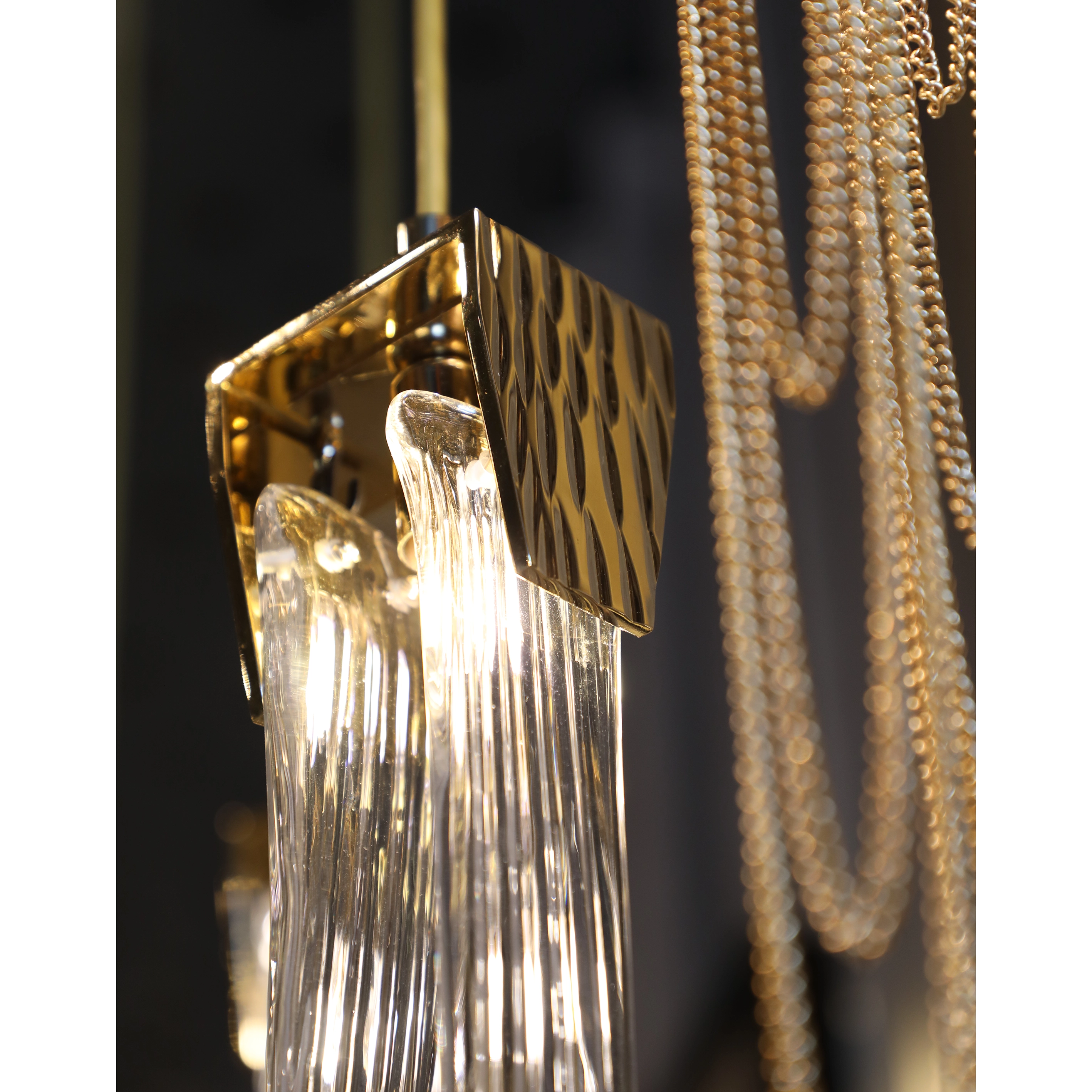 /storage/Luxury brass and crystal Stala Pendant with intricate stalactite-inspired design, a sophisticated modern lighting piece that exudes elegance and timeless charm.