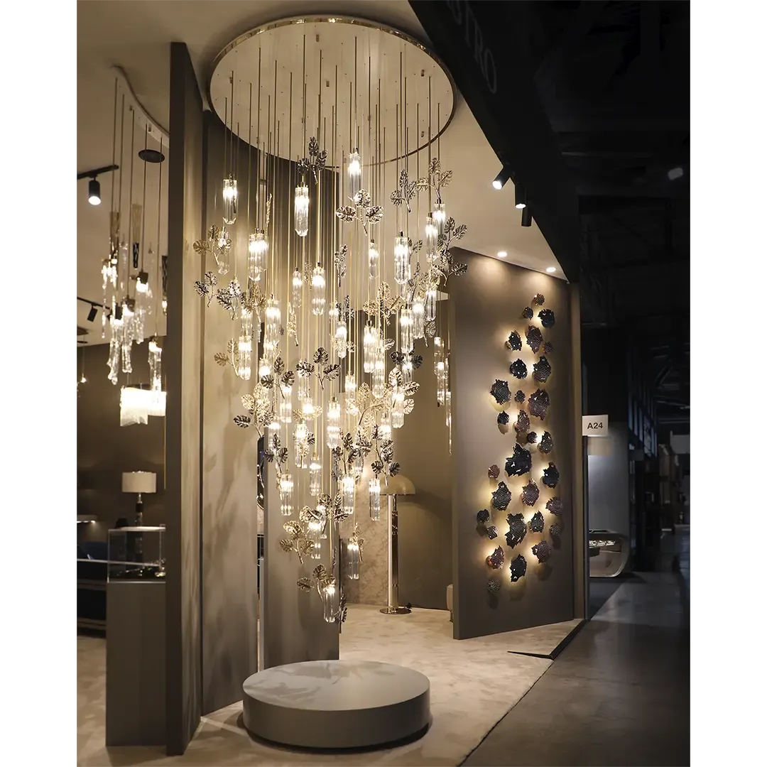 /storage/Luxury gold-plated brass suspension with handcrafted leaf motifs, inspired by nature and designed to bring organic elegance to any space.