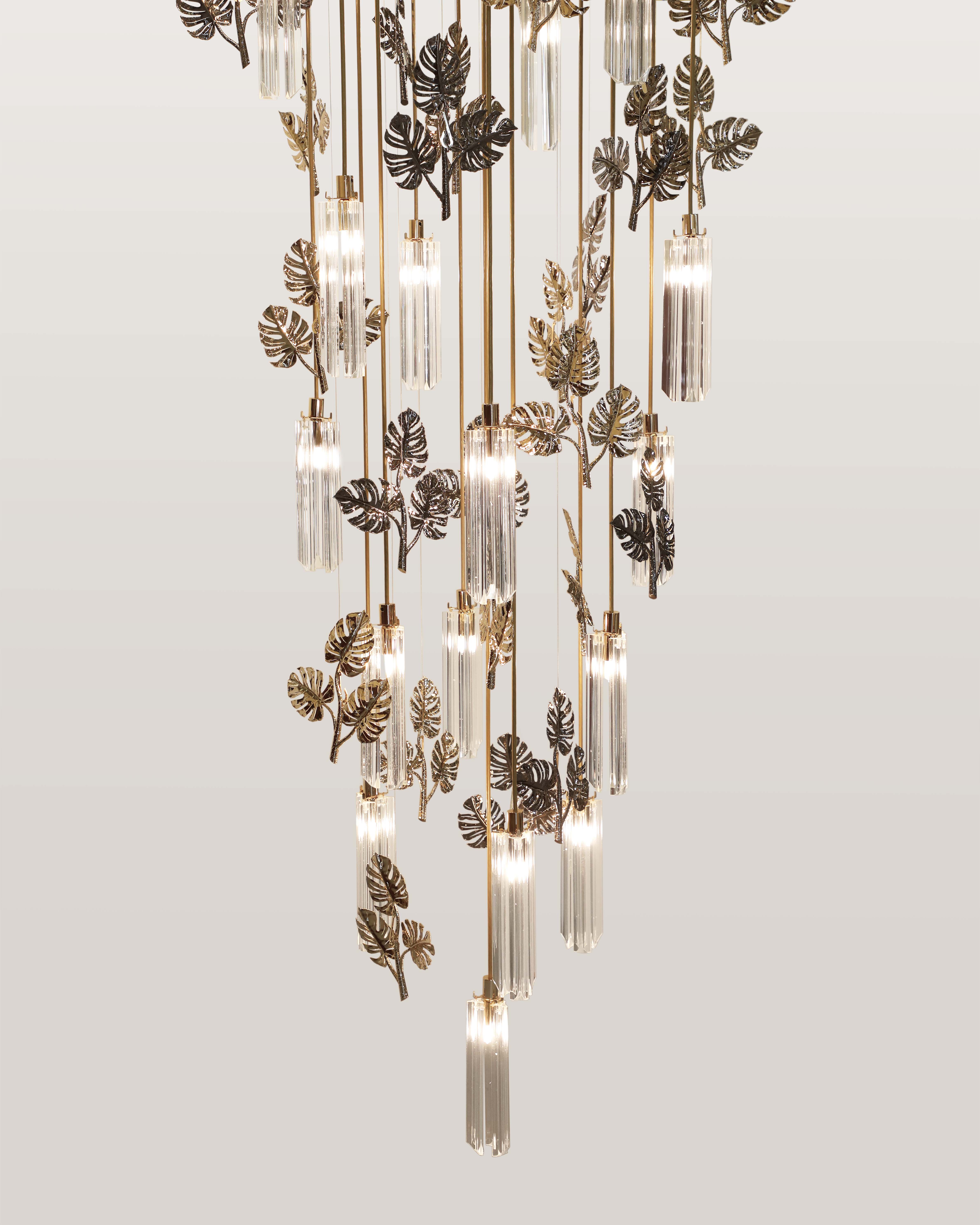 /storage/Luxury gold-plated brass suspension with handcrafted leaf motifs, inspired by nature and designed to bring organic elegance to any space.