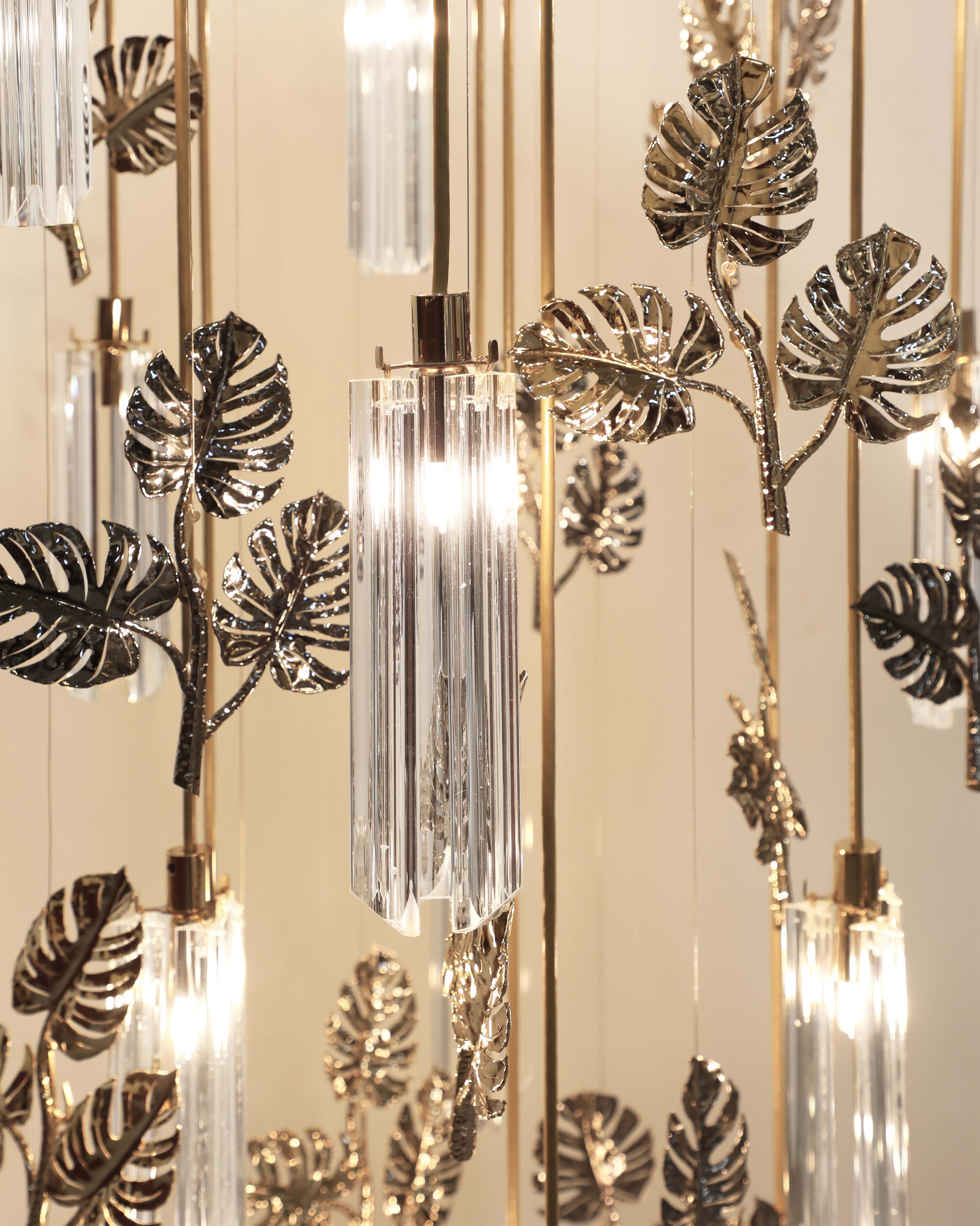 /storage/Luxury gold-plated brass suspension with handcrafted leaf motifs, inspired by nature and designed to bring organic elegance to any space.