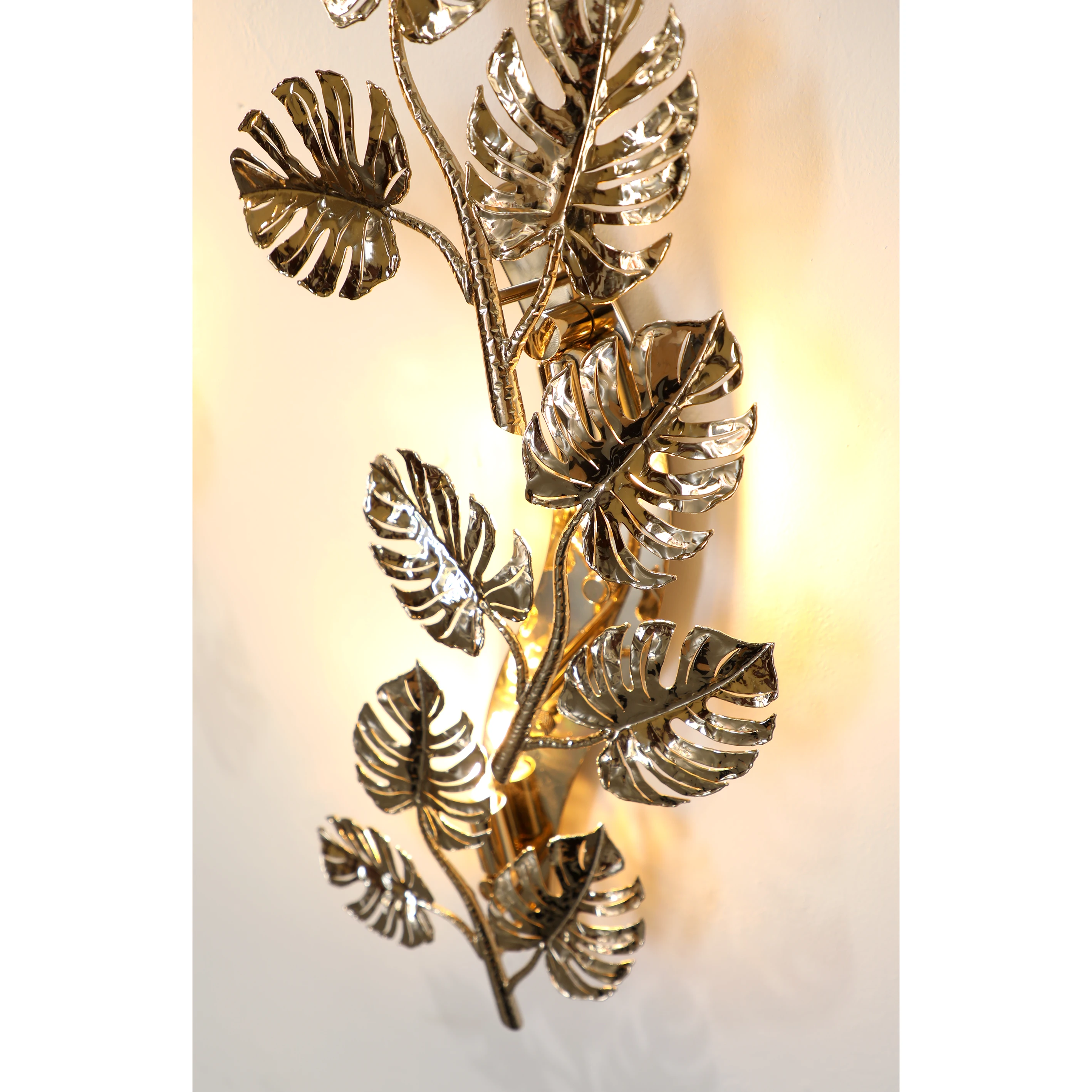 /storage/castro lighting Terra wall light nature inspired sconce with brass leaves