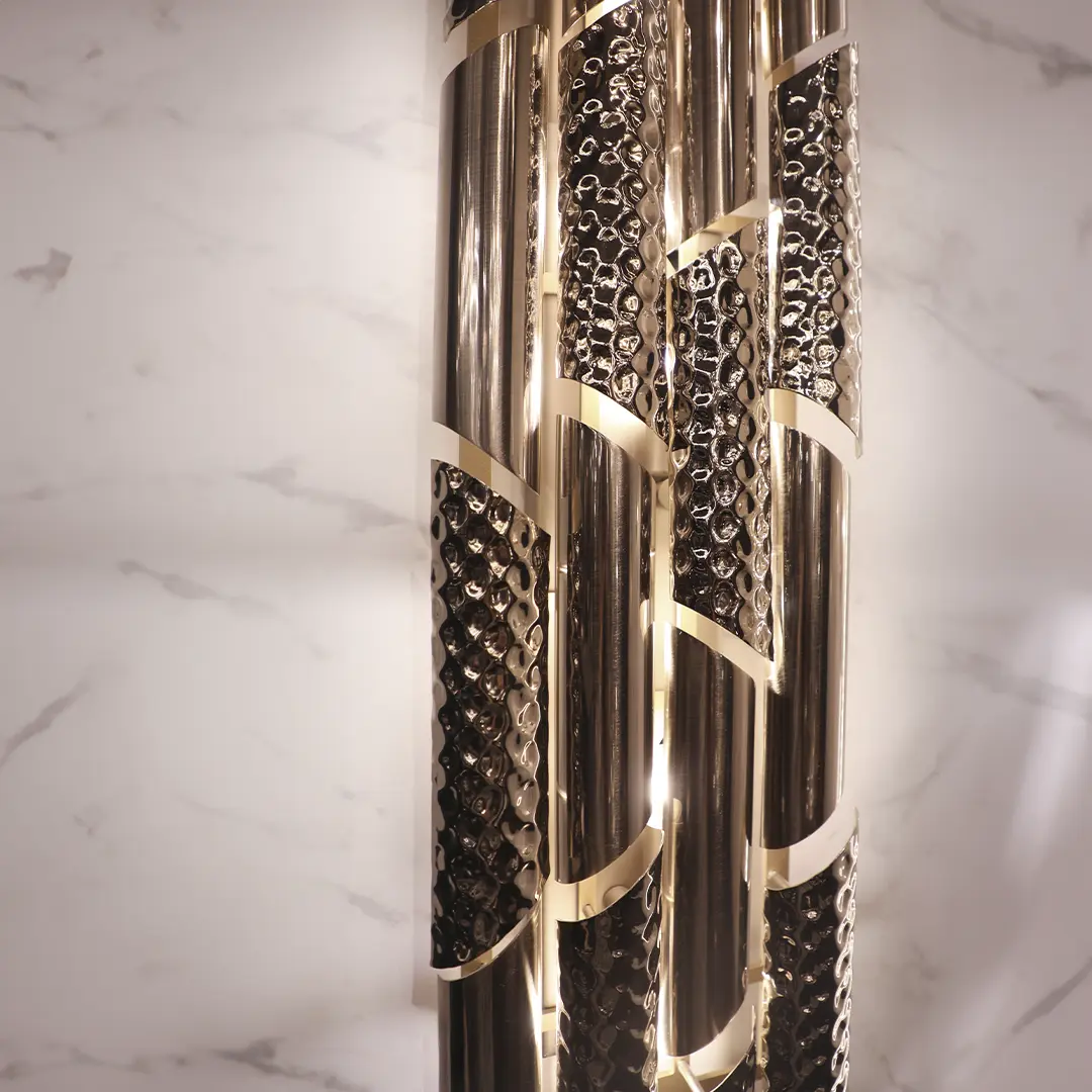 /storage/Luxury brass Triumph Wall Light with hammered and polished tubes, a handmade contemporary sconce for modern interiors.