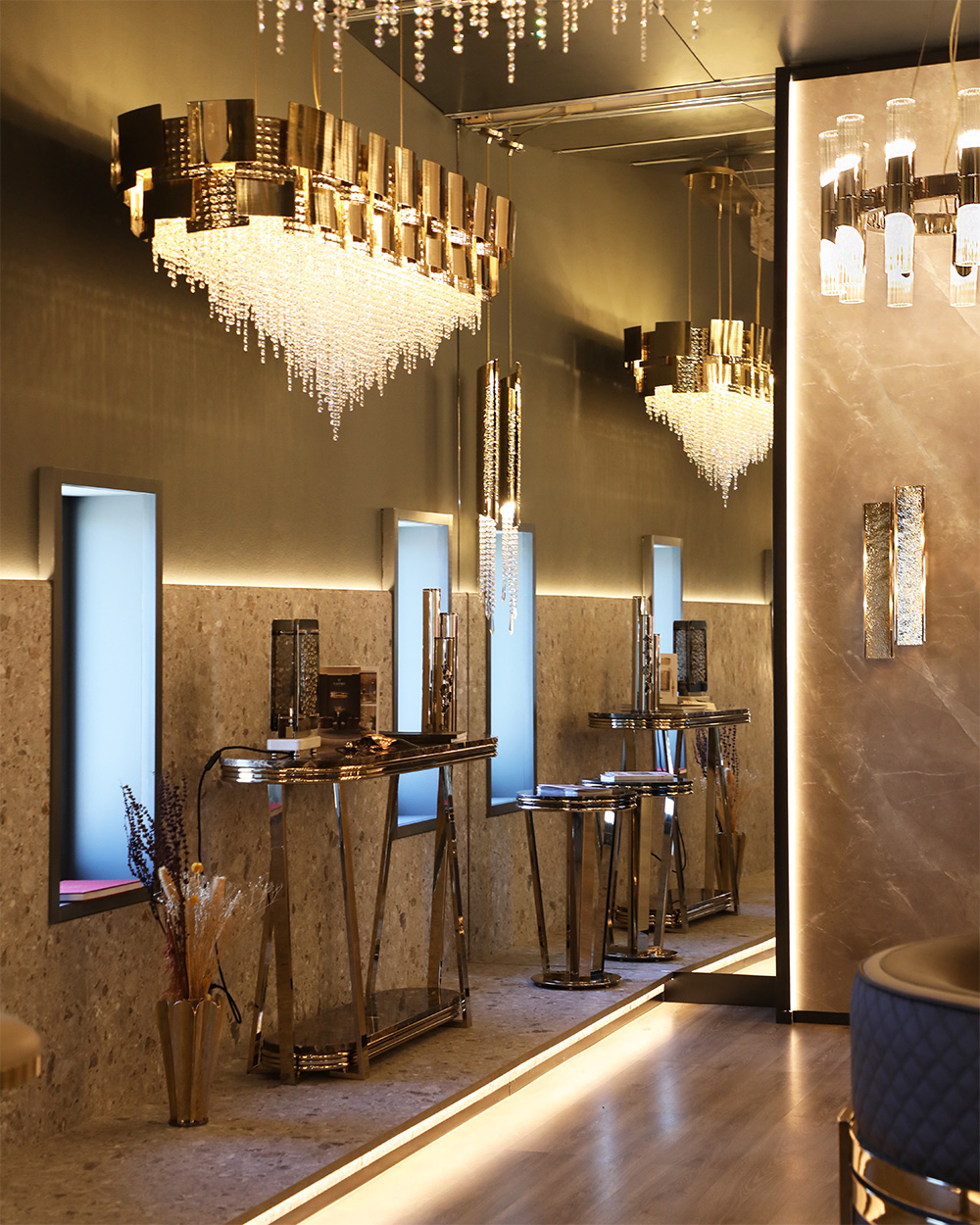 Mondrian Suspension Snooker chandelier by Castro Lighting, a geometric brass and glass design showcased above a dining table for a striking modern statement.