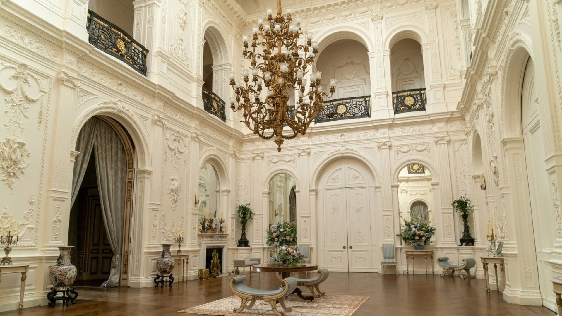Romantic luxury interior from Netflix’s Bridgerton Season 4, showcasing soft pastel colours, decorative wall details and a refined Regency aesthetic.