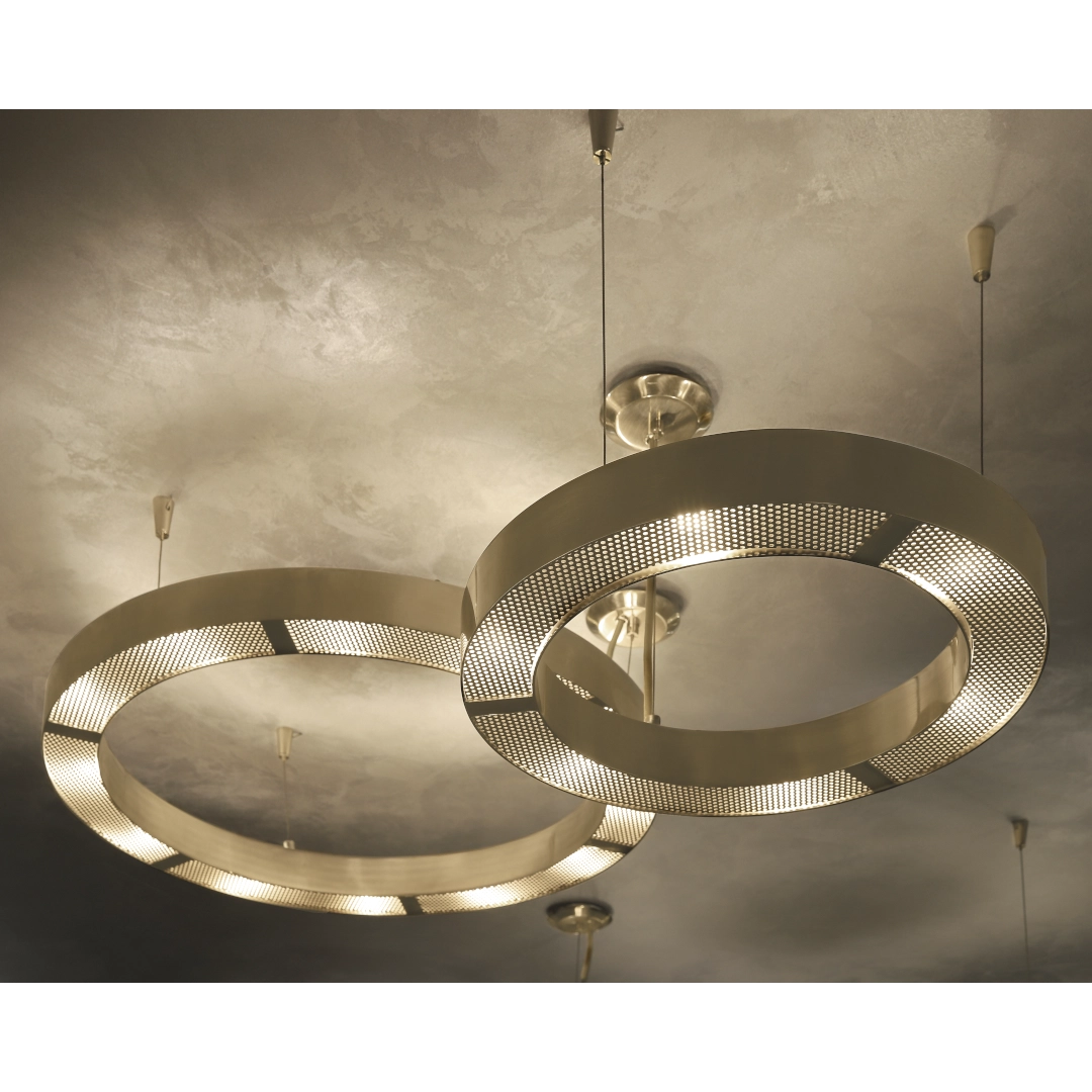 /storage/Luxury brass suspension with delicate crystal accents and minimalist design by Castro Lighting.