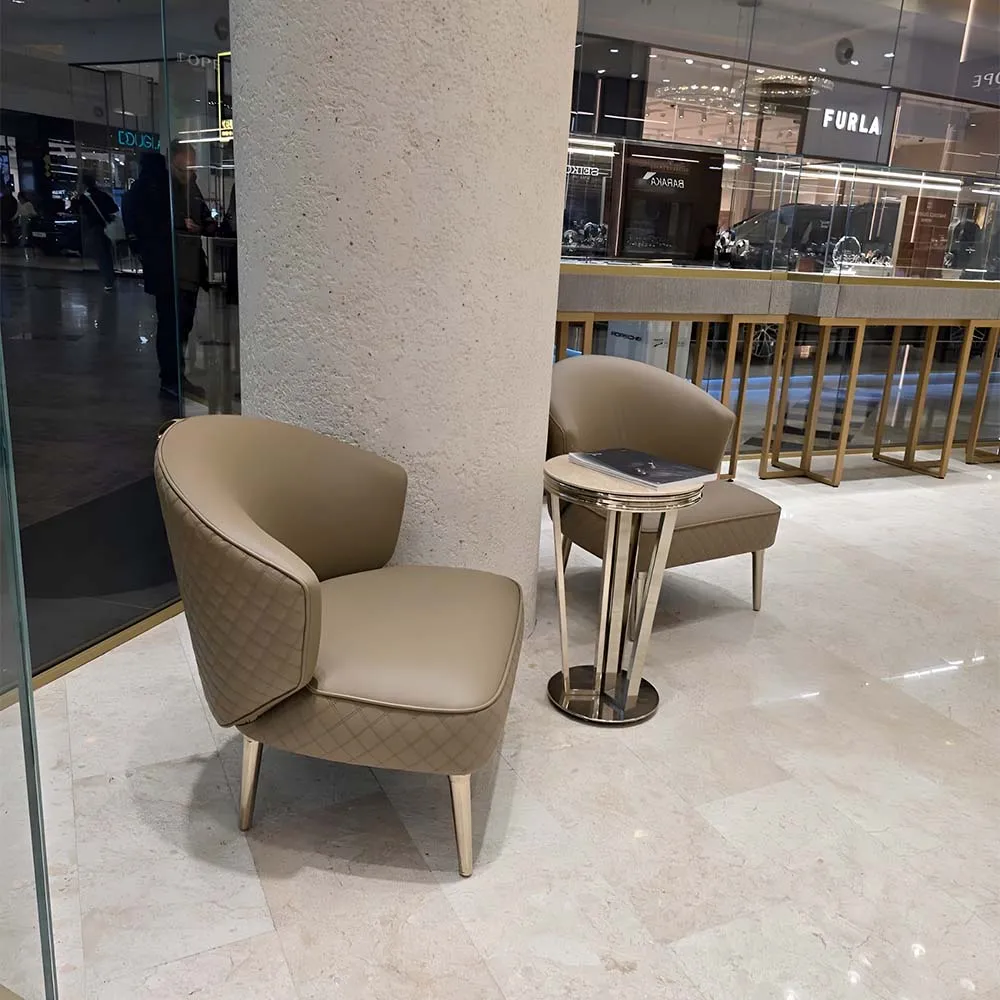 /storage/Luxury brass bar chair with leather upholstery and elegant detailing, inspired by Italian design with a refined, timeless aesthetic.