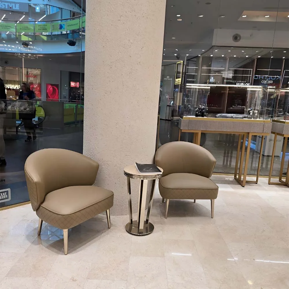 /storage/Luxury brass bar chair with leather upholstery and elegant detailing, inspired by Italian design with a refined, timeless aesthetic.