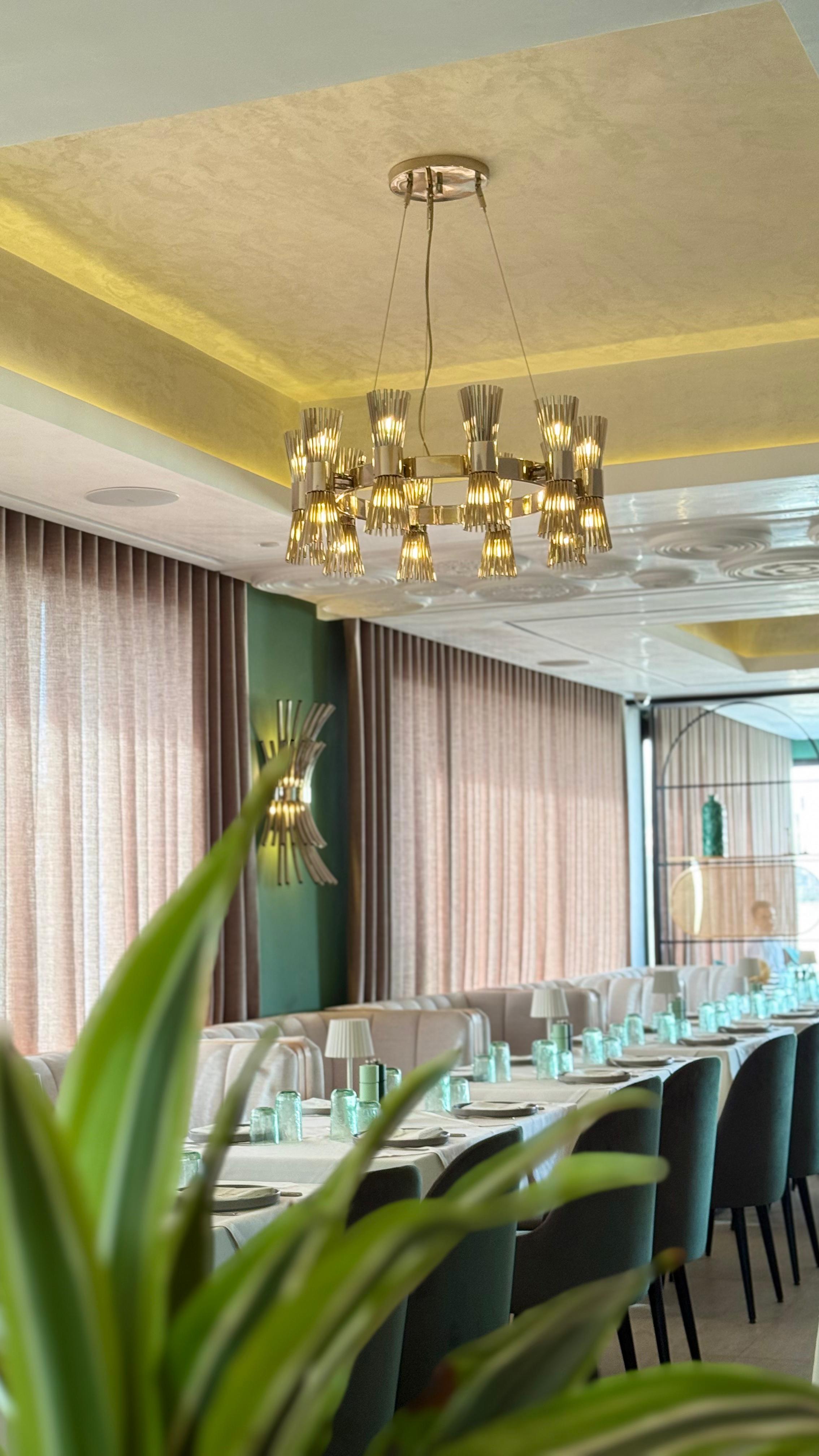 Interior of La Cantine d’Agadir restaurant in Morocco featuring contemporary design with Halo Collection lighting and furnishings by Castro Lighting.