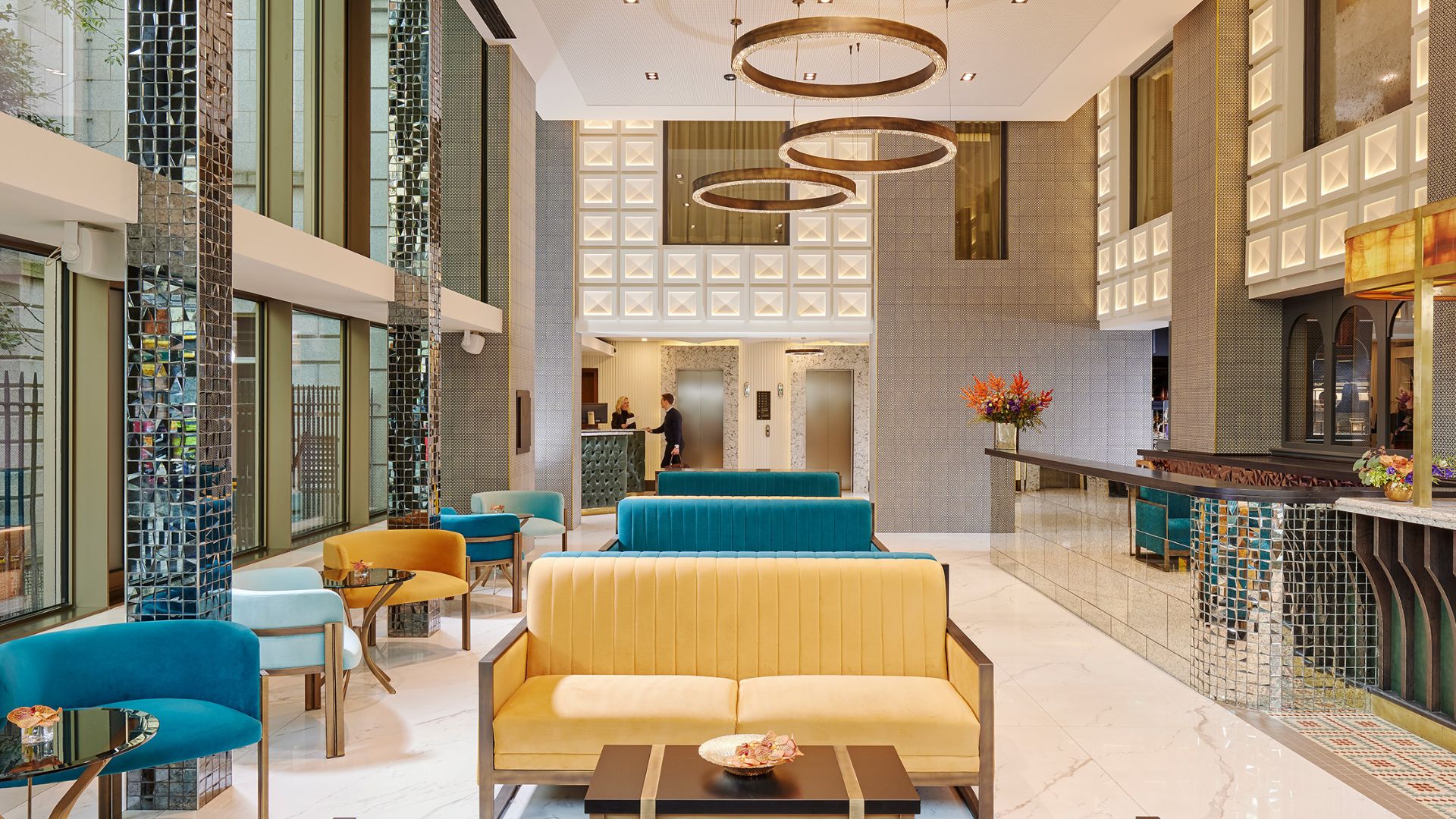 Hotel Lobby featuring Castro Lighting's Metis Suspension, Marie Chair, Haring Side Table and Pablo Sofa | Image Courtesy: