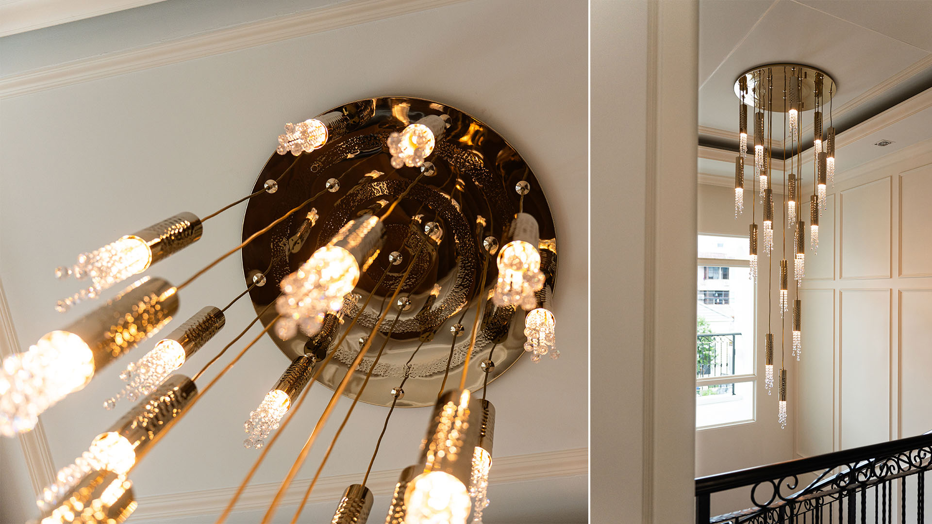 Staircase interior featuring the Safi Suspension by Castro Lighting, with multiple elongated brass and crystal elements creating a sculptural cascade of light through the vertical space.