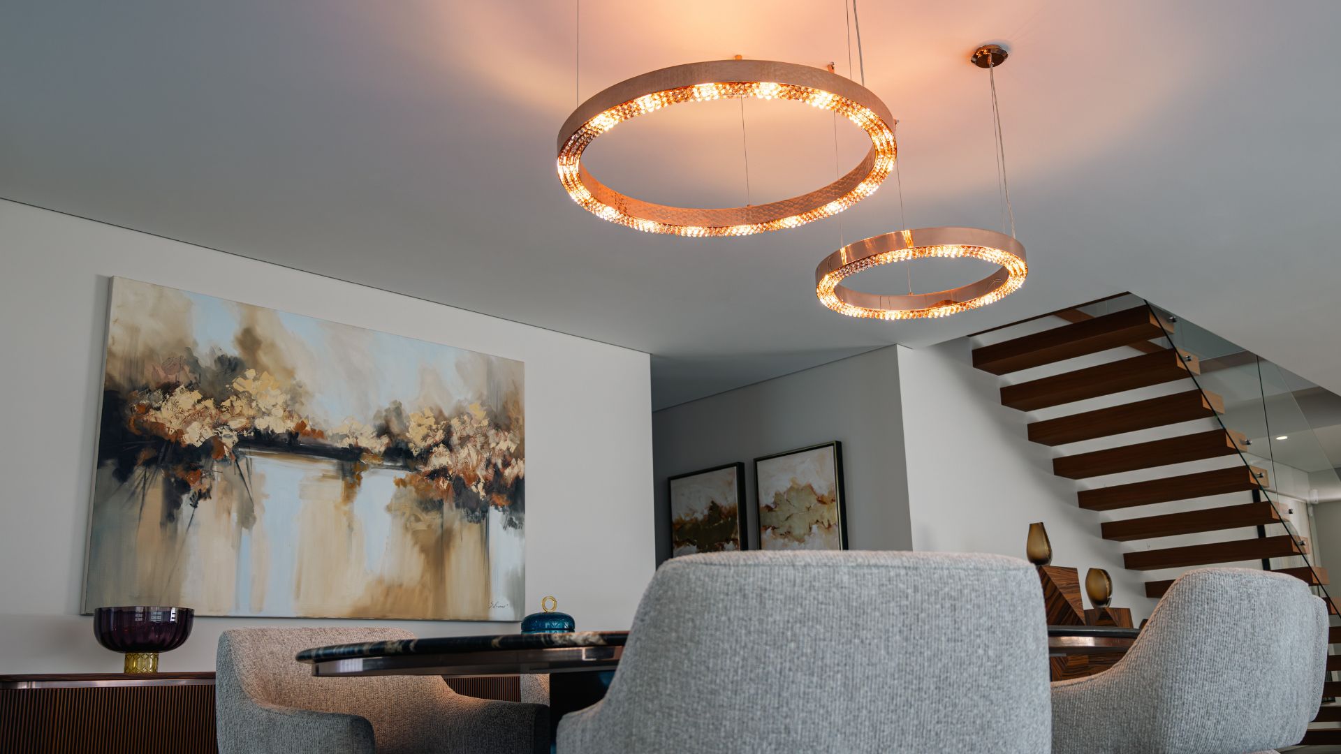 Metis Suspension by Castro Lighting in a refined dining interior designed by Alfaiate Interiores, featuring a copper brass finish that enhances the space with a warm and sophisticated glow.