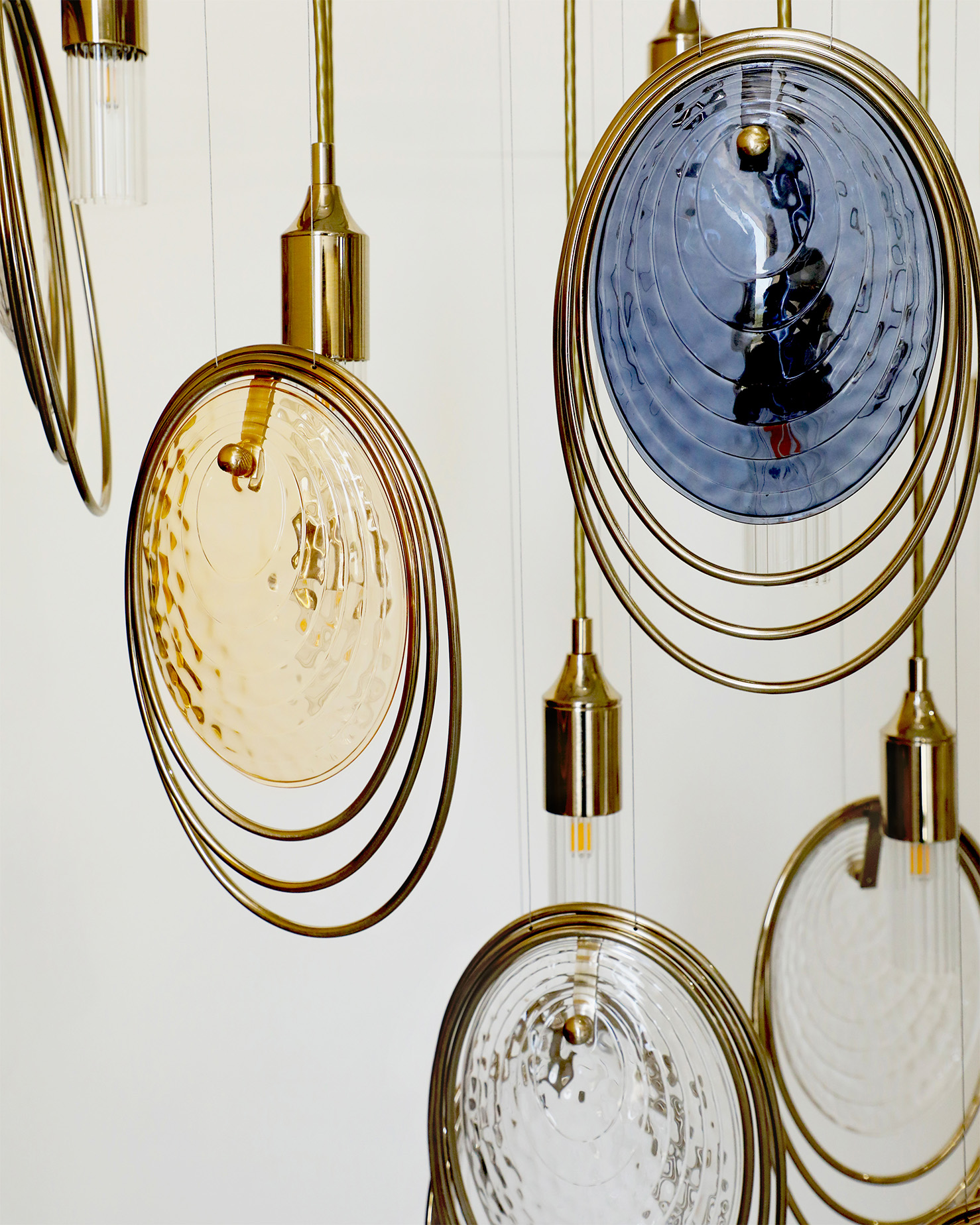 Coral Collection luxury lighting pendants in Ocean Blue and Amber Orange finishes side by side